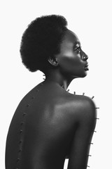 Beautiful black girl with metal pins