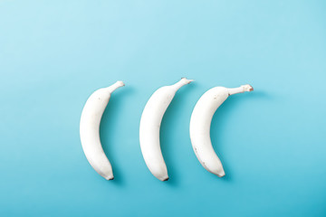 White banana on pastel blue background. Minimal fashion, flatlay , top view. Albino Different Creativity Creative Thinking Ideas Concept