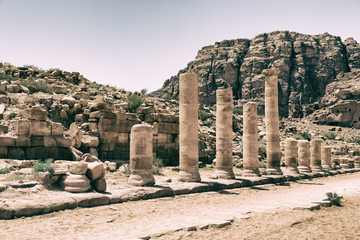  the antique street full of columns and  heritage