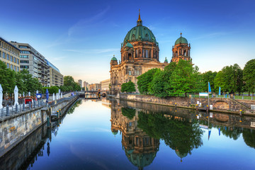 Fototapeta premium Berlin Cathedral (Berliner Dom) reflected in Spree River at dawn, Germany