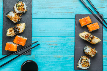 Two black boards with rolls