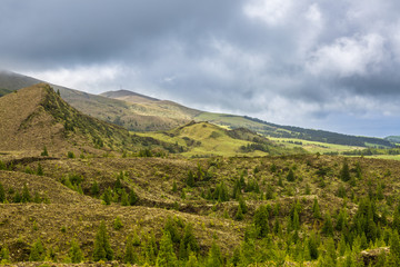 Landscape over blue and green lakes.