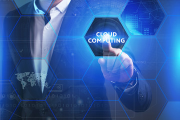 Business, Technology, Internet and network concept. Young businessman working on a virtual screen of the future and sees the inscription: Cloud computing