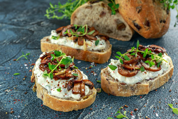 Garlic mushroom toast with creamy herbed ricotta chees spread