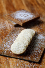 Diamant Sable - Classic Shortbread Cookies, on wooden board, on wooden table. 