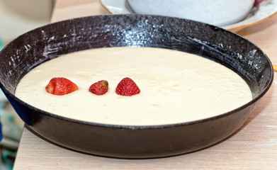 pie-shaped sponge cake with strawberries