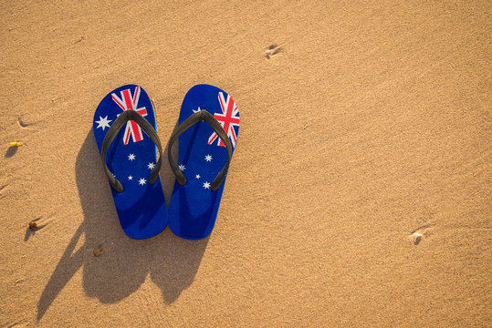 Aussie thongs on the beach at sunset