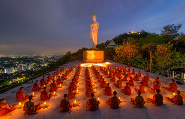 Chonburi, THAILAND - April 8: Thai monks and buddhist prayers and meditation with buddha statue...
