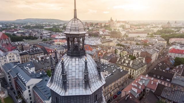 Aerial view of the Corpus Christi Church and Wawel Castle in Krakow, Poland at sunset time