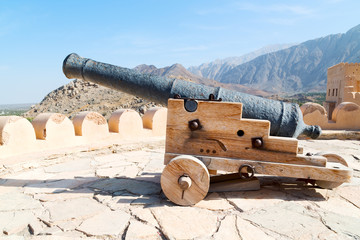 Fototapeta na wymiar in oman muscat the old castle and cannon near the wall