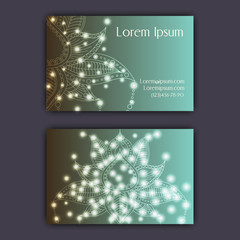 Vector vintage visiting card set. Glowing shiny floral mandala pattern and ornaments. Luxury design.