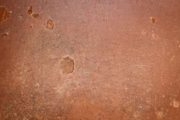 Textured brown background. Old iron.