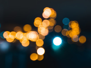 Beautiful glowing city in the bokeh in the rain gorgeous background texture