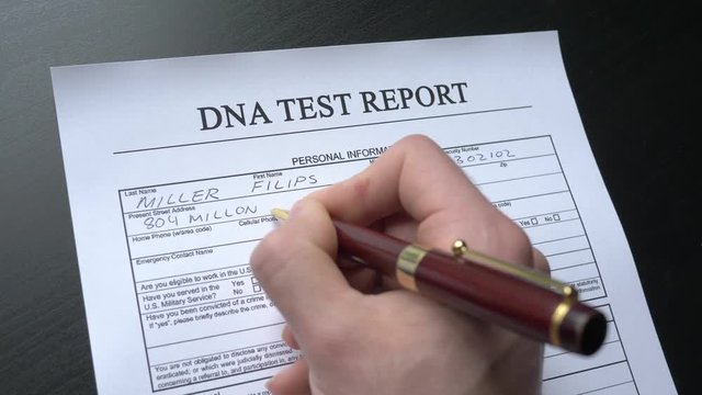 Filling a report to get a DNA test.
