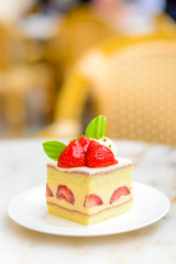 Strawberry Chiffon Entremet cake on white china plate