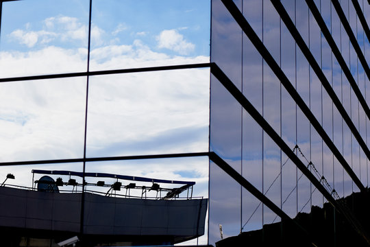 The Reflection Of The Sky Mirrored Building. High