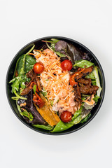 Delicious fresh salad and olive oil
