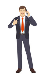 Businessman pointing his finger at the mobile phone