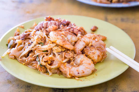 Close-up Penang Char Kuey Teow or fried noodle with prawns