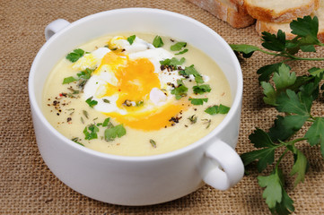 potato cream soup with poached eggs