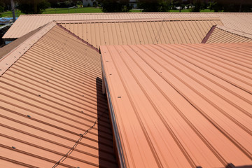 Strip of running metal roof of a building