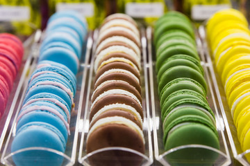 Lines of colorful  macaroons in intalian shop