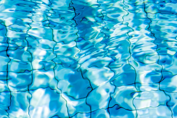 Blue water background in swimming pool