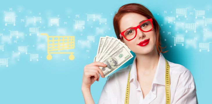women in red glasses with money