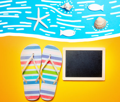 Summertime flip-flops and copy space board