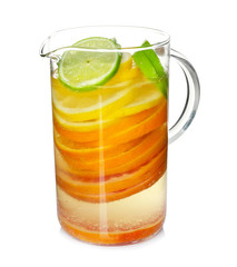 Tasty lemonade with slices of citrus fruits on white background