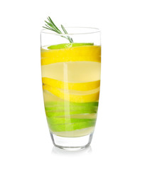 Glass of tasty lemonade with slices of citrus fruits on white background
