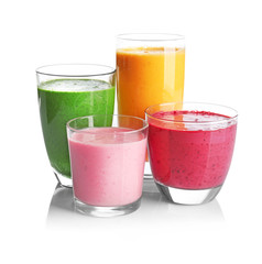 Fruit smoothies with kiwi, blueberry, orange, strawberry flavors on white background
