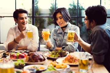 People in asian are celebrating the festival they clink glasses beer and dinner happy