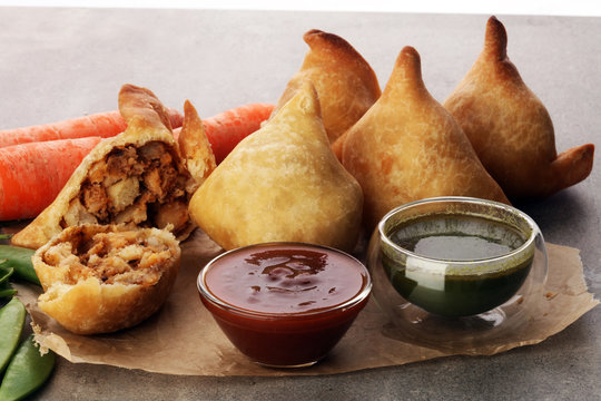 Indian special traditional street food punjabi samosa or Coxinha, Croquete and other Fried Brazilian Snacks