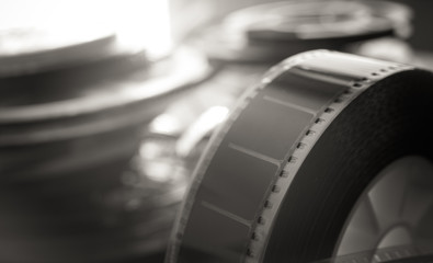 Fototapeta premium Past time movie symbol, 35 mm film reel evocative objects