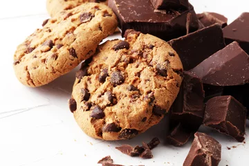 Foto op Plexiglas Dessert Chocolate cookies on white background. Chocolate chip cookies shot