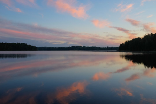 Midnight sun, Finland. Sunrise in middle on June during midnight sun period.