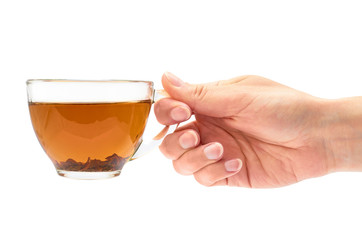 Female hand holds a cup of tea. Isolated on white background