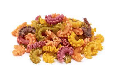 background of raw colored macaroni. Isolated on white background