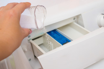 Pour powder into the washing machine