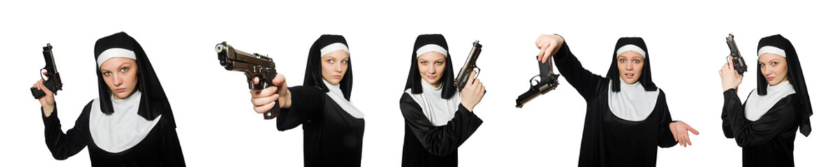 Nun with handgun isolated on white