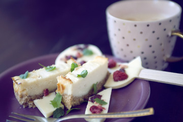 cheese cake dessert with chocolate lollipop and coffee cup