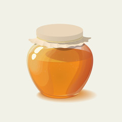 Glass jar of honey.
