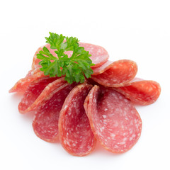 Salami smoked sausages slices isolated on white background.