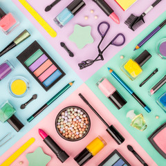 set of professional decorative cosmetics, makeup tools and accessory on multicolored background. beauty, fashion and shopping concept. flat lay composition, top view