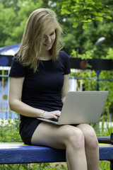 Business lady in the park