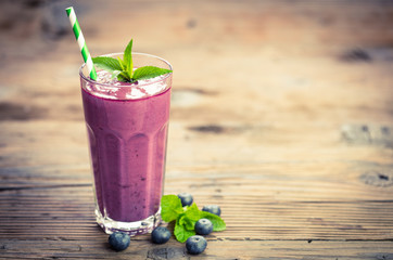 Fresh blueberry smoothie in the glass