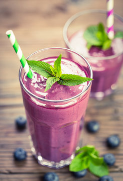 Fresh blueberry smoothie in the glass