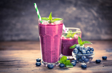 Fresh blueberry smoothie in the glass