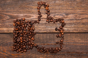 Like gesture made from coffee beans. Love for coffee, high quality, endorsement, social networks...